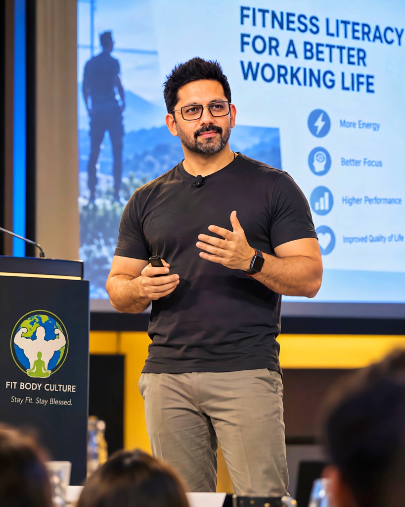 Ankush Bhaskar speaking on stage
